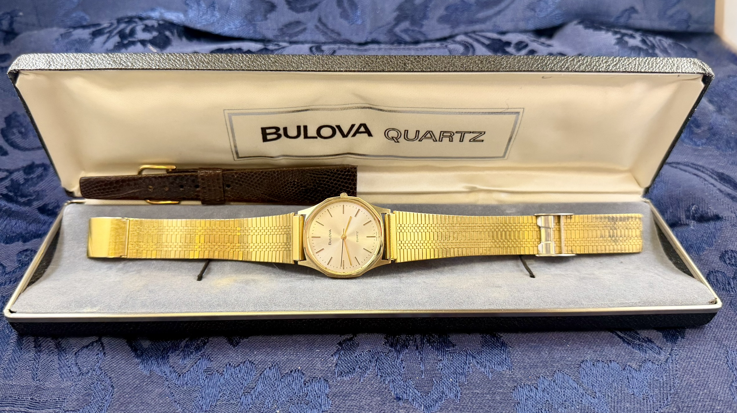 Gold Colored Men's Bulova with Extra Bands Marked Genuine Lizard · Lot 1676